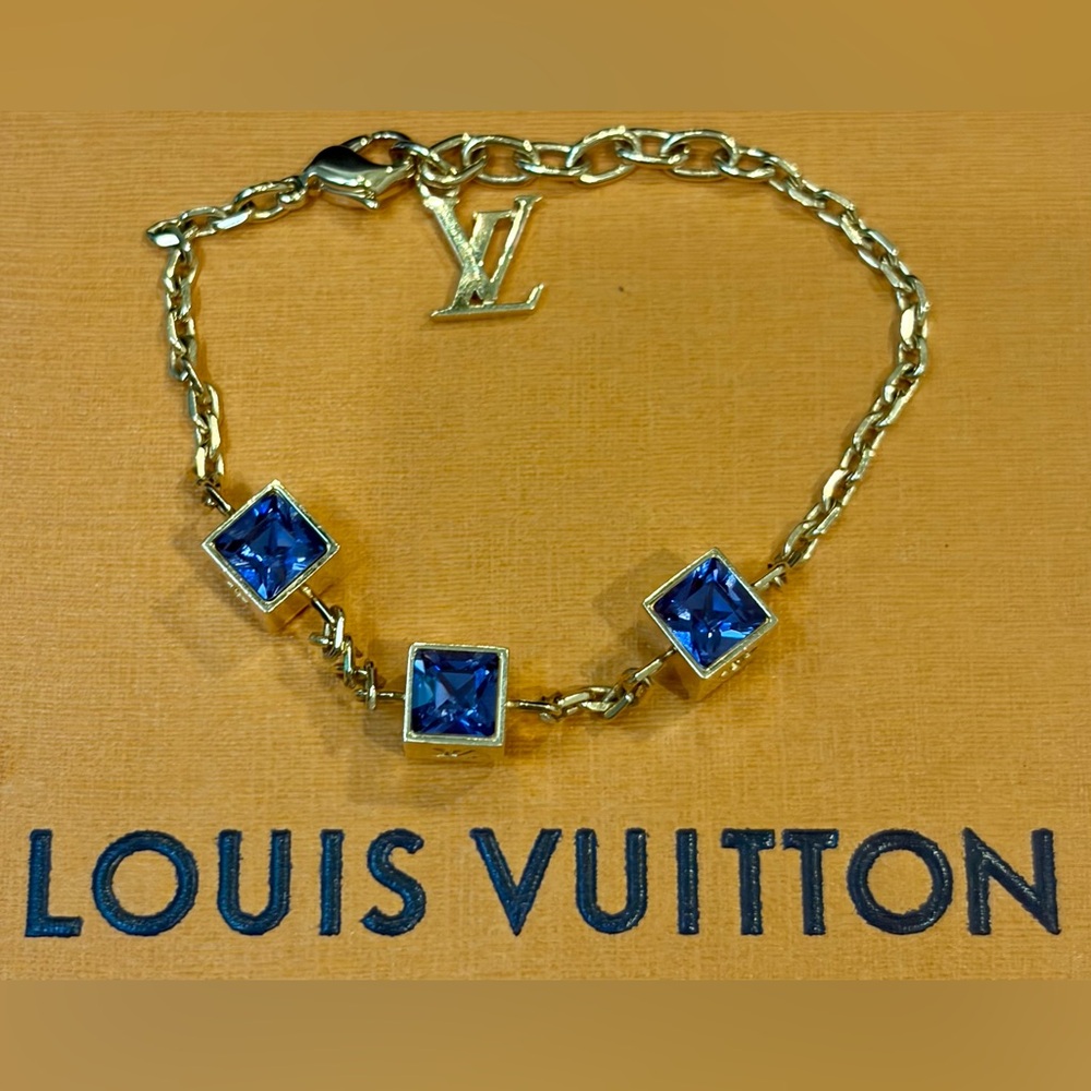 LOUIS VUITTON Gold Chain Bracelet w/Blue Crystal Squares & Logo Modern and Chic